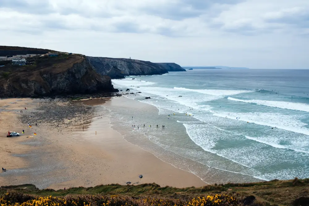 Surfing at Porthtowan beach in Cornwall
