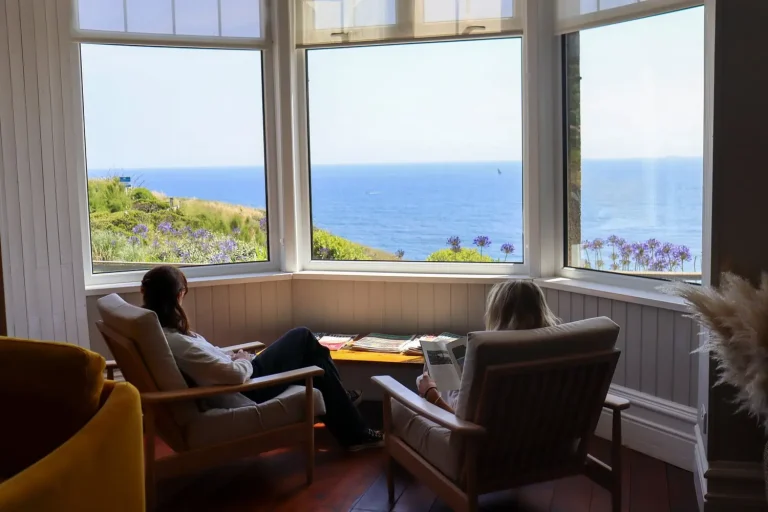 Guests Admiring the Beautiful View at Housel Bay Hotel.webp