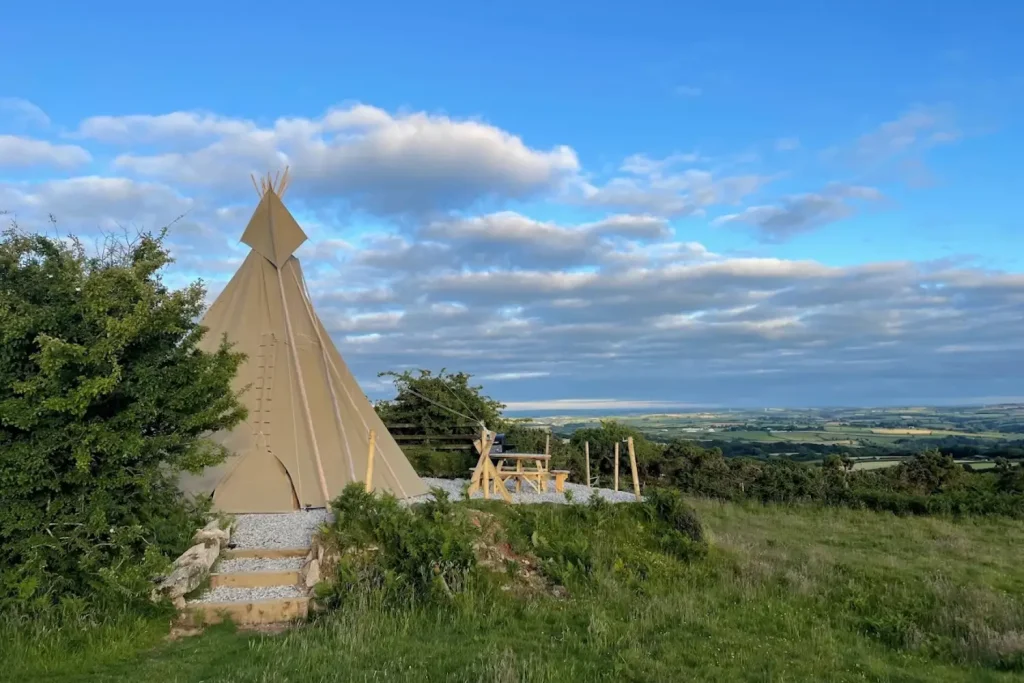 Stars and Moor Tent and Grass Field