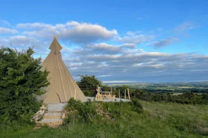 Stars and Moor Tent and Grass Field