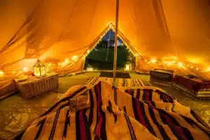 The Paddock Wild Camp Tent Interior at Night