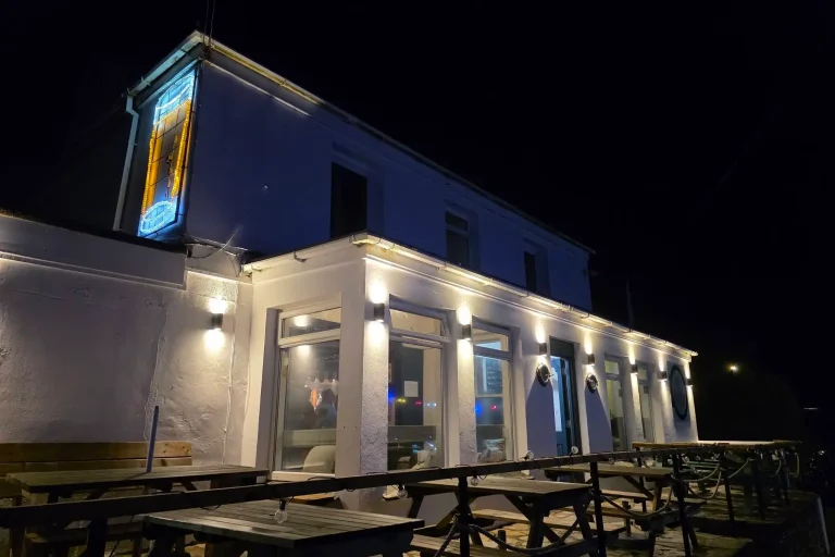 Atlantic Inn Exterior at Night.webp