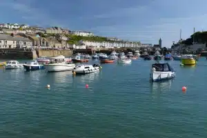 Boats in Porthleven Harbour by Elliot Walker