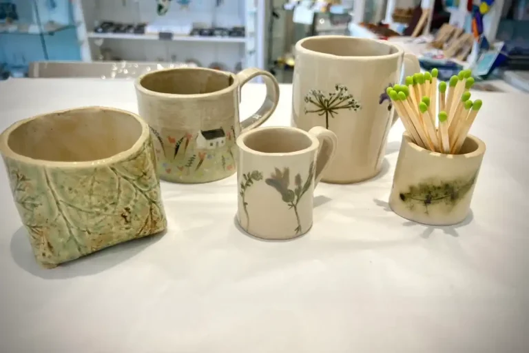 Four Crows Gallery Mug Pieces.webp