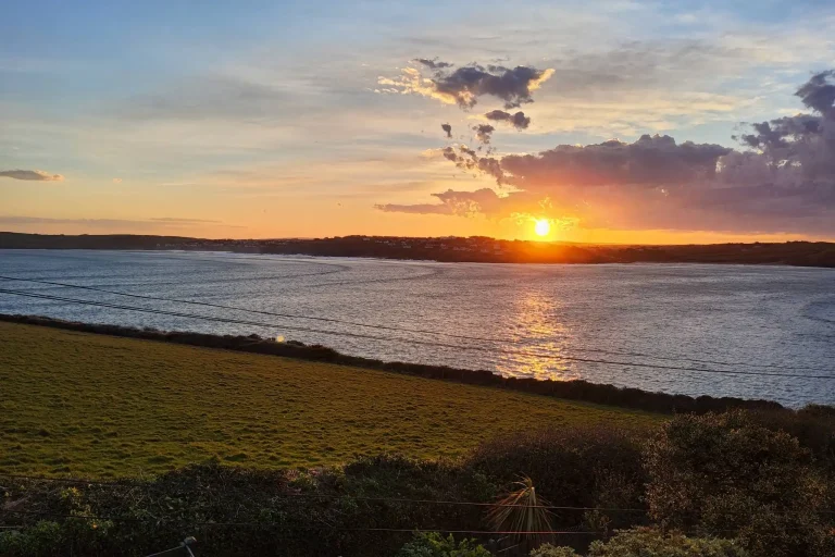 Rest a While Tea Garden Sunset View.webp